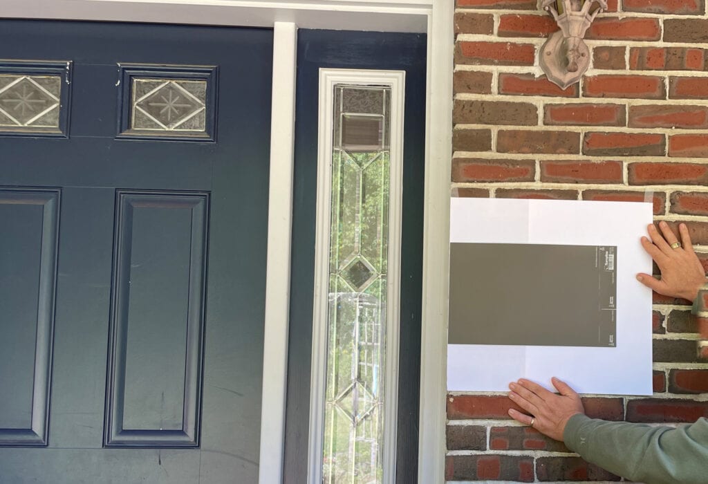 Red brick exterior with Sherwin Williams Folkstone, dark taupe