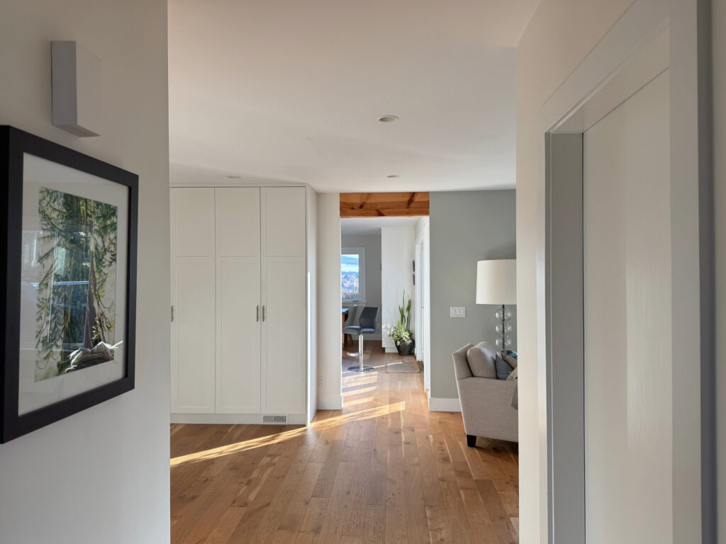 Benjamin Moore Classic Gray, Puritan Gray and Cloud White trim, white ceiling, fir flooring