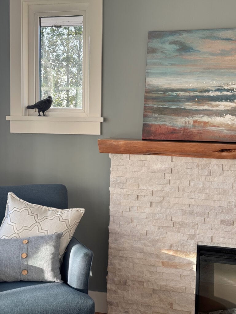 Benjamin Moore Puritan Gray with white beige and gold stone fireplace, fir mantel, Cloud White  on the trim