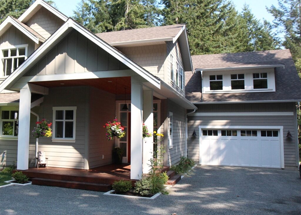 Benjamin moore Rockport Gray with taupe roof on exterior with Cloud White trim and white garage door