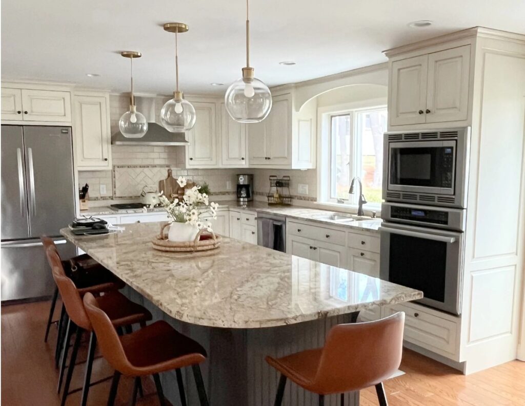 Cream kitchen cabinets with white ceiling, golden oak floor, older granite countertops, best white paint color for ceilings
