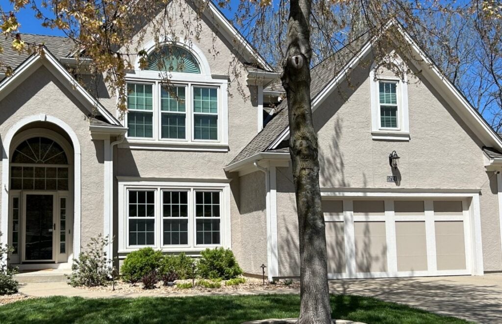 Sherwin Williams Aesthetic White, best off white exterior trim color with BAlanced Beige painted stucco, white windows, possible