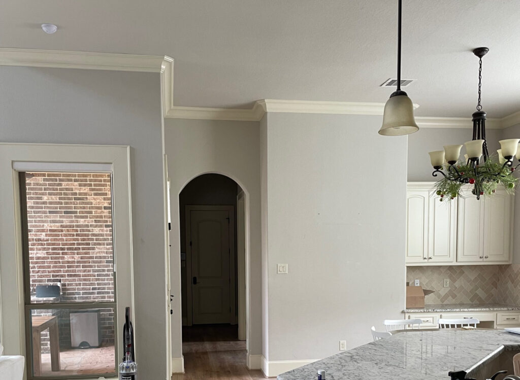 Sherwin Williams Agreeable Gray walls, bad with cream trim, granite countertop, cream cabinets don't do it