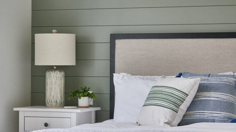 Sherwin-Williams-Evergreen-Fog-best-green-paint-color-on-horizontal-shiplap-in-guest-bedroom-with-bed-linens-home-decor-scaled (1)
