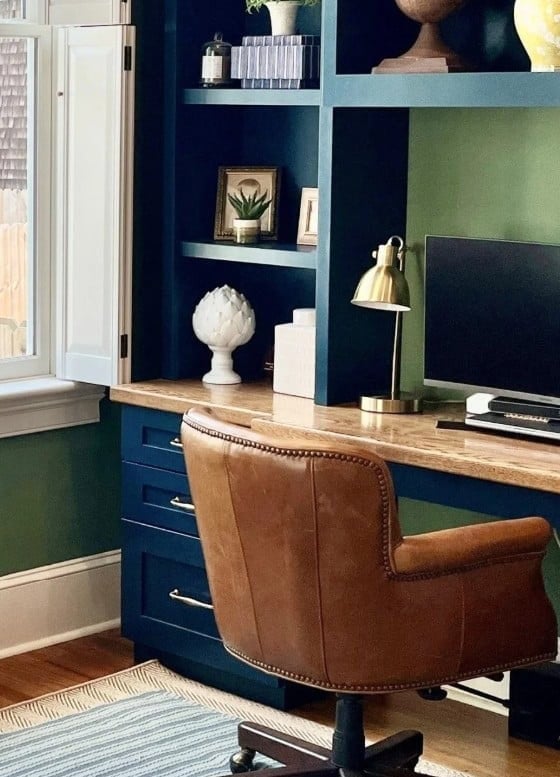 Home office with Farrow and Ball Hague Blue desk and Calke Green walls