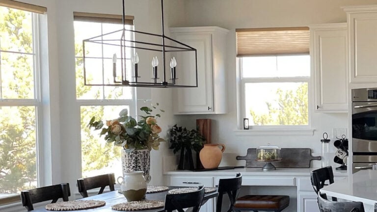 Sherwin Williams Pure White in a kitchen and dining area. ON walls, cabinets, and trim. Colors for east-facing rooms