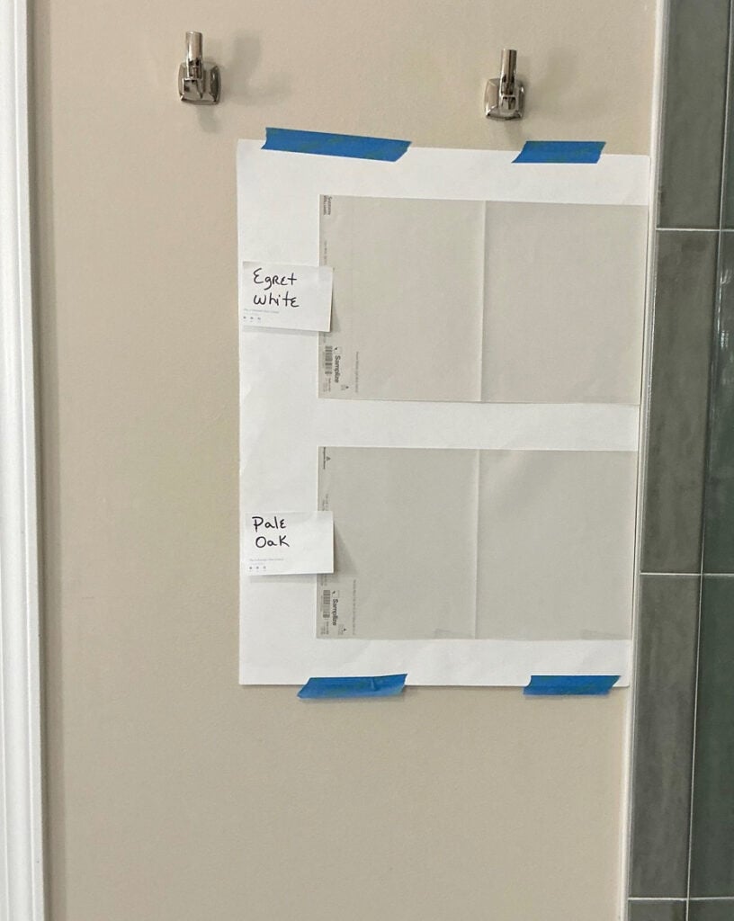 Benjamin MOore Pale Oak and Classic Gray paint samples in comparison