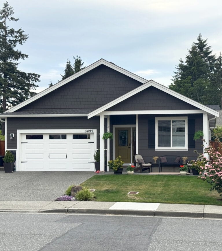 James Hardie Rich Espresso, dark brown exterior siding with BEnjamin Moore Cloud White trim and garage doors