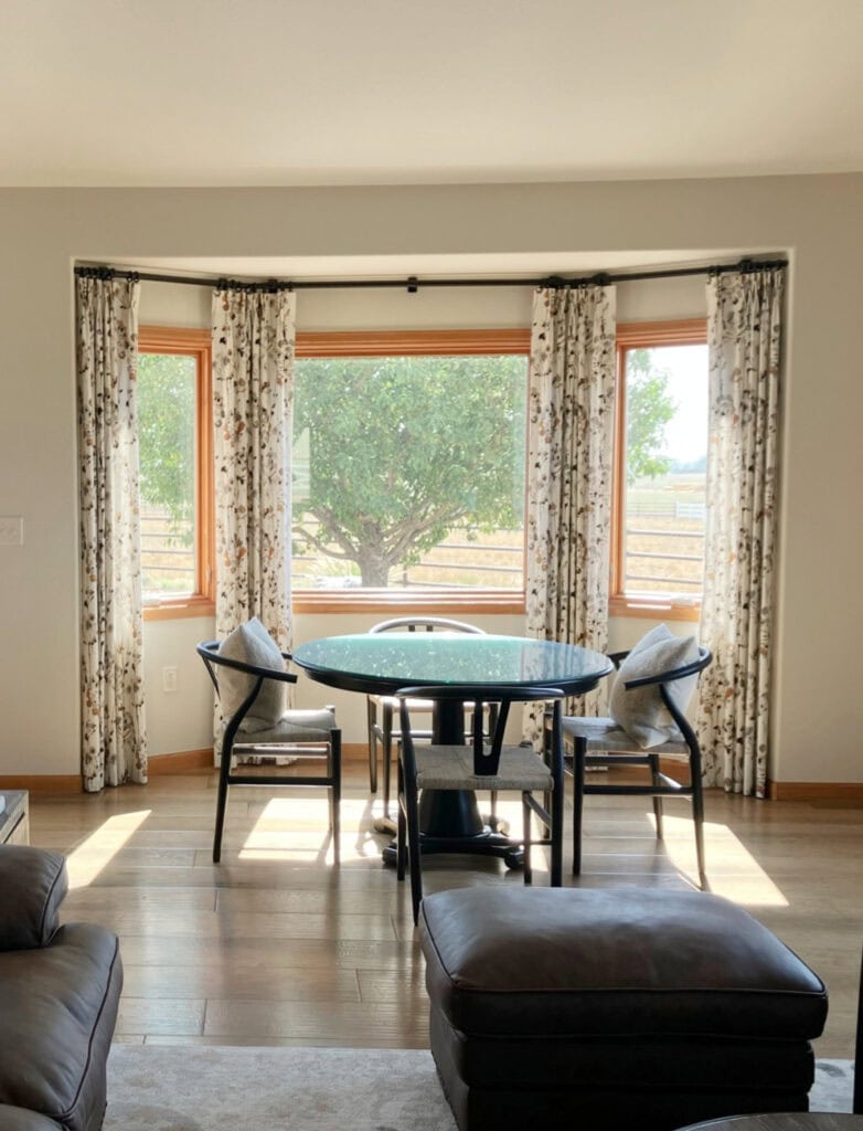 Sherwin Williams White Duck with golden oak window trim in southeast facing suinshine with wood flooring (2)