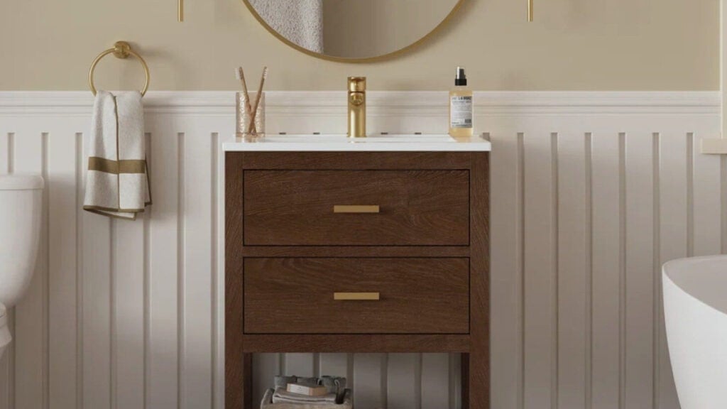 Small bathroom wood vanity with gold hardware, product image from website
